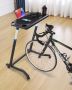 Mobile folding exercise bike with table and lockable wheels