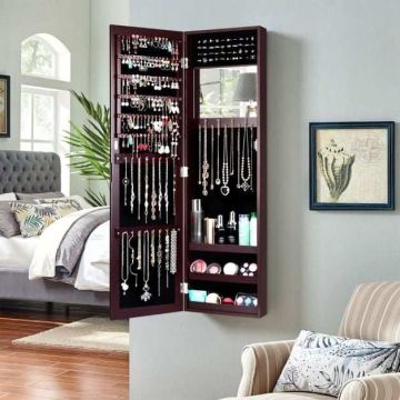 Mirrored jewelry cabinet with holes for earrings and rings, brown